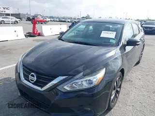 2018 Nissan Altima SR with VIN 1N4AL3AP7JC279459, listed as a IAAI auction lot 41901831 with 104,798 mi miles and . Bid and sale history available at DreamBid. Image 17.