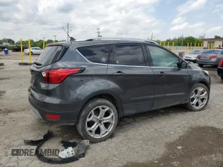 2019 Ford Escape Titanium with VIN 1FMCU0J93KUA81968, listed as a Copart auction lot 56232665 with 26,631 mi miles and Salvage title. Bid and sale history available at DreamBid. Image 3.
