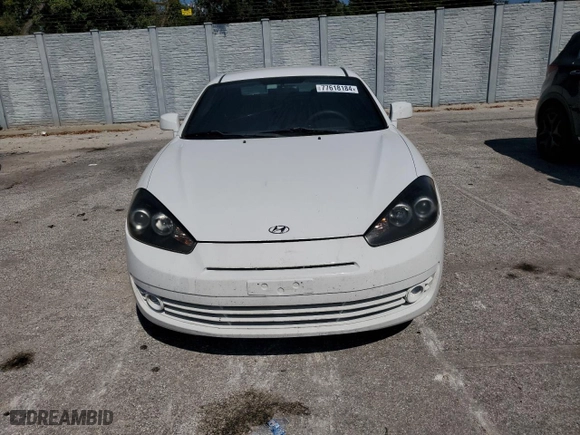 2007 Hyundai Tiburon GS with VIN KMHHM66D67U248918, listed as a Copart auction lot 77618184 with 145,703 mi miles and Salvage Title. Bid and sale history available at carsss.com. Image 5.