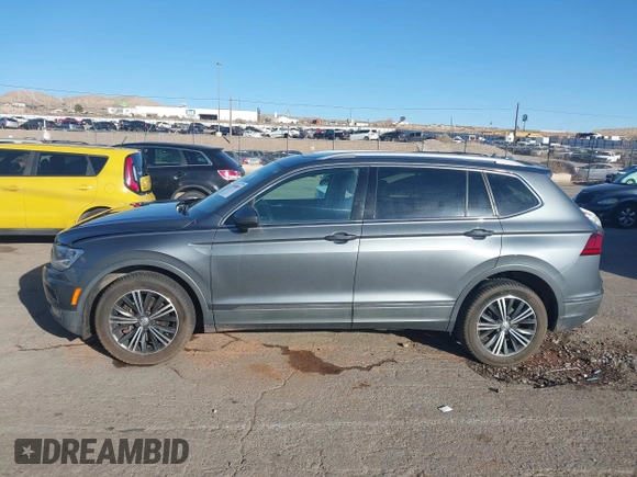 2018 Volkswagen Tiguan SEL z VIN 3VV3B7AXXJM088230, wystawiony jako IAAI lot #41680855 z przebiegiem 130 807 mil mil oraz . Historia ofert i sprzedaży dostępna na DreamBid. Obrazek 14.