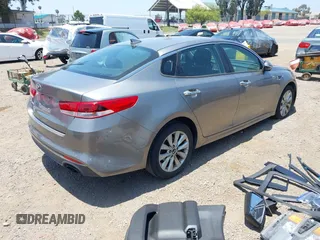 2018 Kia Optima LX with VIN 5XXGT4L34JG266575, listed as a IAAI auction lot 42458844 with 73,394 mi miles and . Bid and sale history available at DreamBid. Image 4.