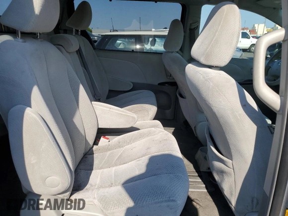 2011 Toyota Sienna LE AAS with VIN 5TDKK3DC6BS054847, listed as a Copart auction lot 64673975 with 197,266 mi miles and Salvage title. Bid and sale history available at DreamBid. Image 11.