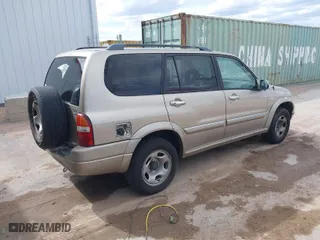 2002 Suzuki XL-7 Standard with VIN JS3TX92V224127965, listed as a IAAI auction lot 42056299 with 176,502 mi miles. Bid and sale history available at carsss.com. Image 4.