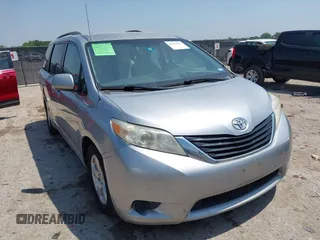 2014 Toyota Sienna LE AAS with VIN 5TDKK3DC9ES511817, listed as a IAAI auction lot 42375053 with 111,413 mi miles and . Bid and sale history available at DreamBid. Image 1.