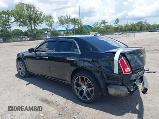 2014 Chrysler 300 C with VIN 2C3CCAKT9EH171614, listed as a IAAI auction lot 39747704 with 129,156 mi miles and . Bid and sale history available at carsss.com. Image 14.
