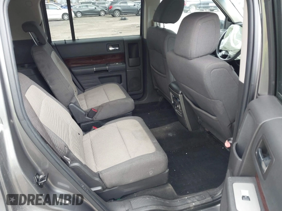 2009 Ford Flex SEL z VIN 2FMDK52CX9BA27679, wystawiony jako IAAI lot #41863371 z przebiegiem 170 993 mil mil oraz . Historia ofert i sprzedaży dostępna na DreamBid. Obrazek 8.