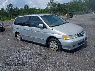2002 Honda Odyssey EX z VIN 2HKRL18692H526842, wystawiony jako IAAI lot #42495810 z przebiegiem 220 289 mil mil oraz . Historia ofert i sprzedaży dostępna na DreamBid. Obrazek 1.