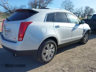 2010 Cadillac SRX Luxury Collection z VIN 3GYFNDEY0AS583143, wystawiony jako IAAI lot #41989581 z przebiegiem 186 731 mil mil oraz . Historia ofert i sprzedaży dostępna na DreamBid. Obrazek 4.
