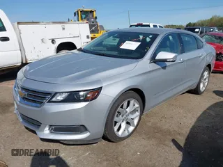 2015 Chevrolet Impala LT z VIN 2G1125S35F9213472, wystawiony jako IAAI lot #41924702 z przebiegiem 124 656 mil mil oraz . Historia ofert i sprzedaży dostępna na DreamBid. Obrazek 2.