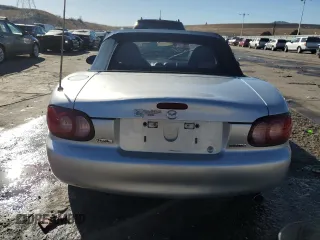 2004 Mazda MX-5 Miata LS with VIN JM1NB353640402308, listed as a Copart auction lot 84568244 with 50,287 mi miles and Salvage title. Bid and sale history available at DreamBid. Image 6.