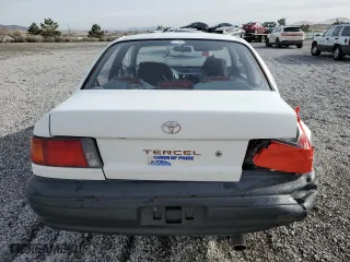 1994 Toyota Tercel with VIN JT2EL46S5R0447670, listed as a Copart auction lot 85165504 with 214,199 mi miles and Salvage Title. Bid and sale history available at carsss.com. Image 6.