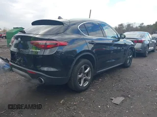 2021 Alfa Romeo Stelvio z VIN ZASPAKAN9M7D15031, wystawiony jako IAAI lot #40869221 z przebiegiem 35 782 mil mil oraz . Historia ofert i sprzedaży dostępna na DreamBid. Obrazek 4.