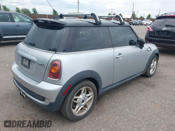 2007 MINI Hardtop S with VIN WMWMF73567TT83738, listed as a IAAI auction lot 42598923 with 133,968 mi miles and . Bid and sale history available at DreamBid. Image 4.