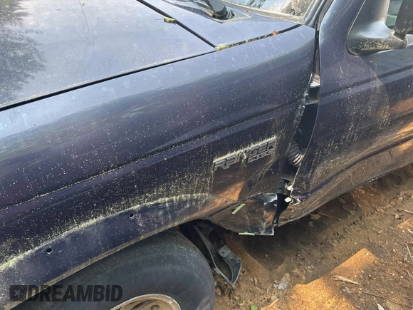 1999 Ford Ranger XL with VIN 1FTZR15V6XTA61496, listed as a Copart auction lot 61017635 with 49,455 mi miles and Clean title. Bid and sale history available at DreamBid. Image 3.
