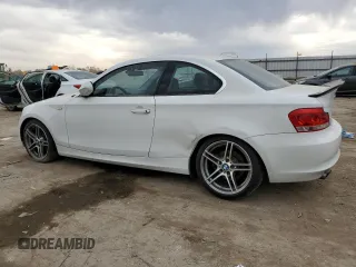 2012 BMW 1 Series 128i with VIN WBAUP7C55CVM54987, listed as a Copart auction lot 76133874 with 124,958 mi miles and Salvage title. Bid and sale history available at DreamBid. Image 2.