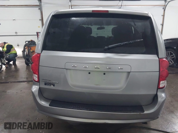2015 Dodge Grand Caravan SE with VIN 2C4RDGBG9FR703691, listed as a IAAI auction lot 41395564 with 170,735 mi miles and . Bid and sale history available at DreamBid. Image 17.