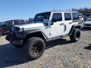 2012 Jeep Wrangler Unlimited Sport with VIN 1C4BJWDG2CL257437, listed as a Copart auction lot 49257965 with 141,695 mi miles and Clean title. Bid and sale history available at DreamBid. Image 1.