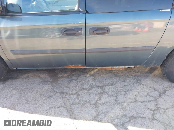 2006 Dodge Grand Caravan SE with VIN 1D4GP24R56B596611, listed as a IAAI auction lot 42057777 with 163,258 mi miles and . Bid and sale history available at DreamBid. Image 17.