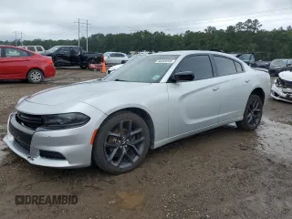 2019 Dodge Charger SXT with VIN 2C3CDXBG6KH591698, listed as a Copart auction lot 58369345 with 128,779 mi miles and Salvage title. Bid and sale history available at DreamBid. Image 1.