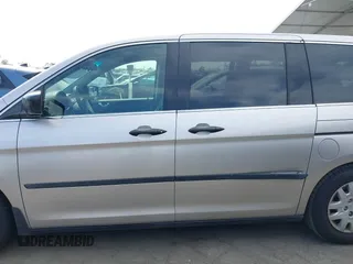2005 Honda Odyssey LX with VIN 5FNRL38245B096035, listed as a IAAI auction lot 41998823 with 209,177 mi miles. Bid and sale history available at carsss.com. Image 14.