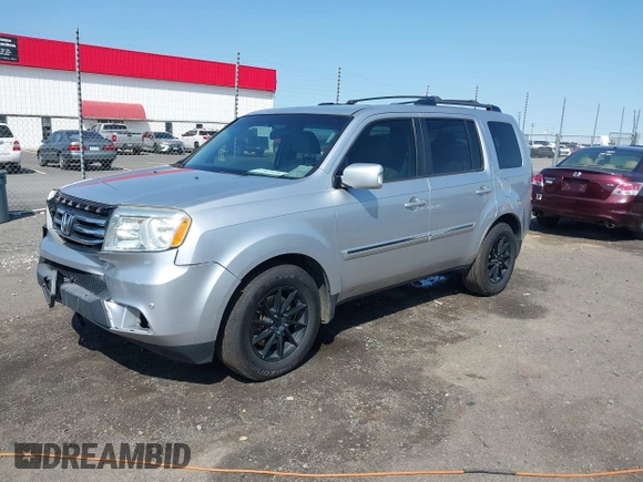 2013 Honda Pilot Touring with VIN 5FNYF3H95DB032438, listed as a IAAI auction lot 41865938 with 298,973 mi miles and . Bid and sale history available at DreamBid. Image 18.