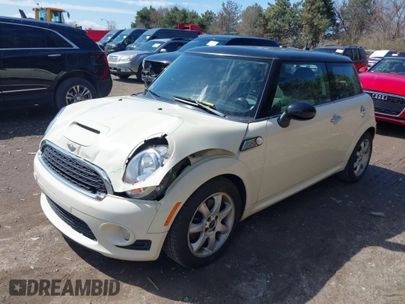 2010 MINI Hardtop S with VIN WMWMF7C55ATZ71881, listed as a IAAI auction lot 41893555 with 77,953 mi miles and . Bid and sale history available at DreamBid. Image 2.