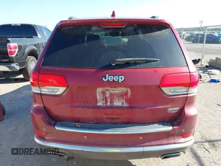 2015 Jeep Grand Cherokee Summit with VIN 1C4RJEJG9FC100568, listed as a IAAI auction lot 42512705 with 128,413 mi miles and . Bid and sale history available at DreamBid. Image 16.