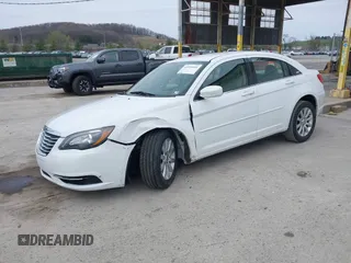 2014 Chrysler 200 Touring with VIN 1C3CCBBBXEN194954, listed as a IAAI auction lot 41939441 with 157,991 mi miles. Bid and sale history available at carsss.com. Image 2.