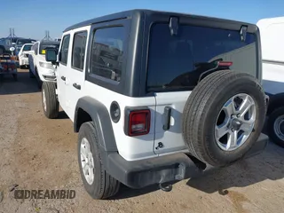 2023 Jeep Wrangler Willys with VIN 1C4HJXDN5PW574731, listed as a IAAI auction lot 42282665 with 68,163 mi miles and . Bid and sale history available at DreamBid. Image 3.