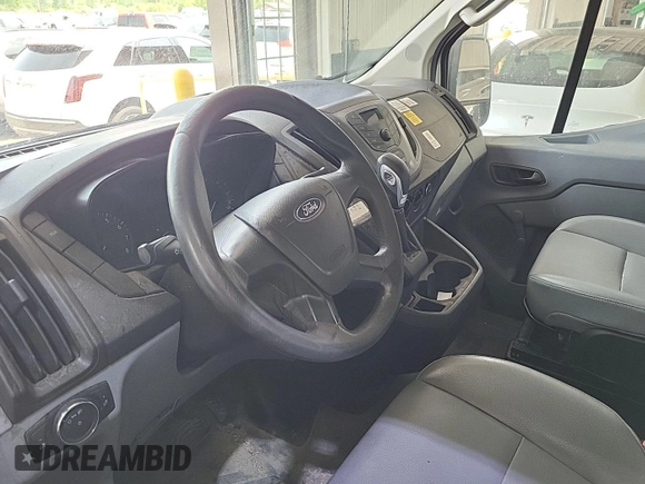 2016 Ford Transit Cargo z VIN 1FTYE1YM4GKB13059, wystawiony jako IAAI lot #42626529 z przebiegiem 260 756 mil mil oraz . Historia ofert i sprzedaży dostępna na DreamBid. Obrazek 29.