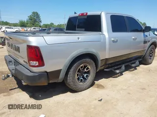 2016 Ram 1500 Rebel z VIN 1C6RR7YT7GS185173, wystawiony jako IAAI lot #42033684 z przebiegiem 152 758 mil mil oraz . Historia ofert i sprzedaży dostępna na DreamBid. Obrazek 4.