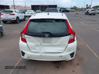 2016 Honda Fit LX z VIN JHMGK5H51GX038519, wystawiony jako IAAI lot #41809636 z przebiegiem 96 894 mil mil oraz . Historia ofert i sprzedaży dostępna na DreamBid. Obrazek 16.