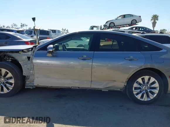 2021 Toyota Mirai XLE with VIN JTDAAAAAXMA002000, listed as a IAAI auction lot 42207752 with 33,017 mi miles and . Bid and sale history available at DreamBid. Image 15.