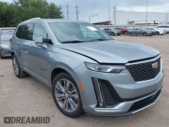 2025 Cadillac XT6 FWD Premium Luxury with VIN 1GYKPCRS0SZ119055, listed as a IAAI auction lot 42574001 with 17,137 mi miles and . Bid and sale history available at DreamBid. Image 1.