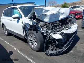 2018 Volkswagen Tiguan S with VIN 3VV0B7AXXJM109354, listed as a IAAI auction lot 41841556 with 67,798 mi miles. Bid and sale history available at carsss.com. Image 1.