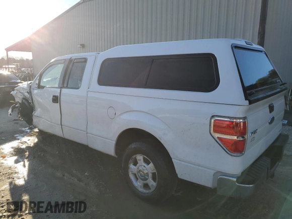 2011 Ford F-150 XL with VIN 1FTEX1CM1BKD07593, listed as a Copart auction lot 86879914 with 189,647 mi miles and Salvage Title. Bid and sale history available at carsss.com. Image 2.