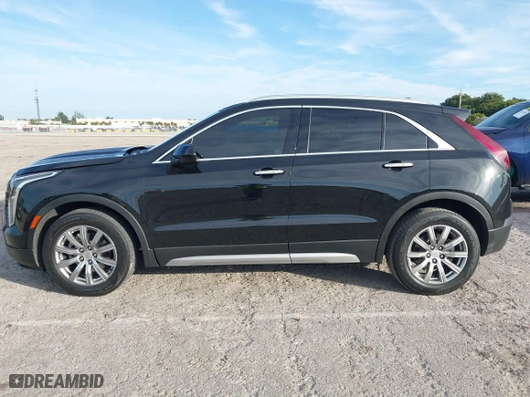 2020 Cadillac XT4 FWD Premium Luxury with VIN 1GYFZCR44LF070832, listed as a IAAI auction lot 41249608 with 77,471 mi miles. Bid and sale history available at carsss.com. Image 14.