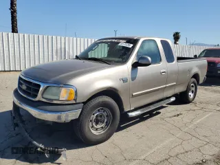2003 Ford F-150 with VIN 2FTRX17L13CA67972, listed as a Copart auction lot 49175295 with 214,580 mi miles and Salvage title. Bid and sale history available at DreamBid. Image 1.