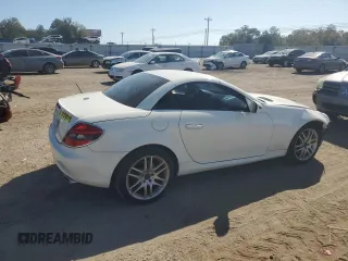 2009 Mercedes-Benz SLK-Class 3.0L with VIN WDBWK54F79F209339, listed as a Copart auction lot 77400294 with 68,540 mi miles and Salvage Title. Bid and sale history available at carsss.com. Image 3.