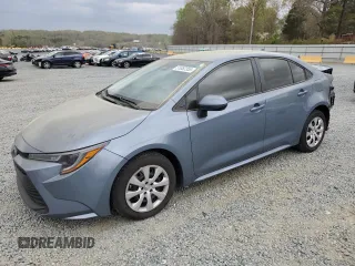 2023 Toyota Corolla LE z VIN 5YFB4MDE4PP047879, wystawiony jako Copart lot #51052355 z przebiegiem 12 385 mil mil oraz Szkoda całkowita • Salvage title. Historia ofert i sprzedaży dostępna na DreamBid. Obrazek 1.