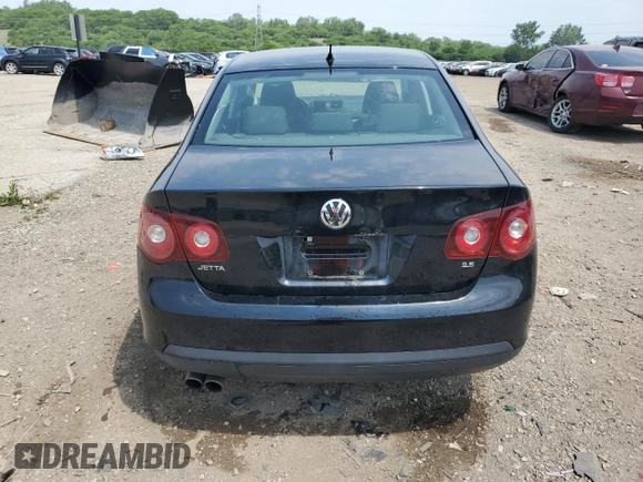 2009 Volkswagen Jetta S with VIN 3VWJM71K69M154382, listed as a Copart auction lot 60513215 with 193,278 mi miles and Salvage title. Bid and sale history available at DreamBid. Image 6.