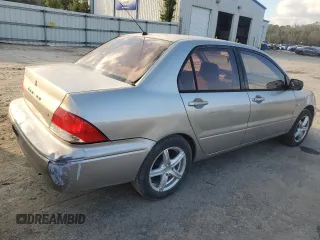 2002 Mitsubishi Lancer ES with VIN JA3AJ26E42U029589, listed as a Copart auction lot 80250264 with 215,276 mi miles and Salvage Title. Bid and sale history available at carsss.com. Image 3.