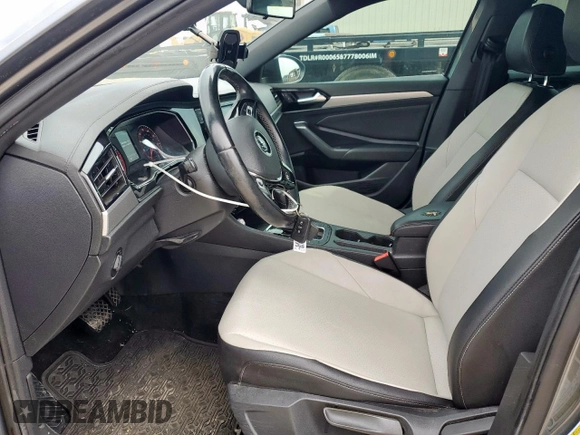 2019 Volkswagen Jetta S with VIN 3VWC57BU9KM089930, listed as a Copart auction lot 58859305 with 63,603 mi miles and Salvage title. Bid and sale history available at DreamBid. Image 7.