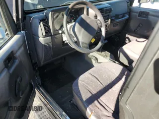 2001 Jeep Wrangler Sport with VIN 1J4FA49S21P339042, listed as a Copart auction lot 56922555 with 113,315 mi miles and Salvage title. Bid and sale history available at DreamBid. Image 8.