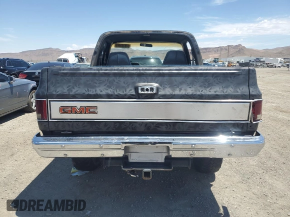 1983 GMC Jimmy z VIN 1G5EK18L4DF518255, wystawiony jako Copart lot #59883814 z przebiegiem 66 093 mil mil oraz Szkoda całkowita • Salvage title. Historia ofert i sprzedaży dostępna na DreamBid. Obrazek 6.