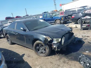 2011 Dodge Charger with VIN 2B3CL1CG8BH556463, listed as a IAAI auction lot 42053328 with 205,825 mi miles and . Bid and sale history available at DreamBid. Image 1.