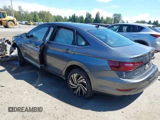 2021 Volkswagen Jetta SEL with VIN 3VWE57BU9MM098736, listed as a IAAI auction lot 42384031 with 28,070 mi miles and . Bid and sale history available at DreamBid. Image 3.