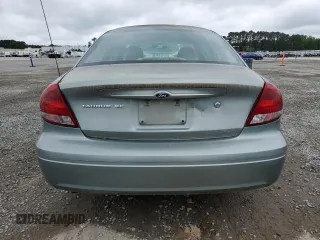 2006 Ford Taurus SE z VIN 1FAFP53U16A142612, wystawiony jako Copart lot #59805145 z przebiegiem 116 999 mil mil oraz Czysty tytuł • Clean title. Historia ofert i sprzedaży dostępna na DreamBid. Obrazek 6.