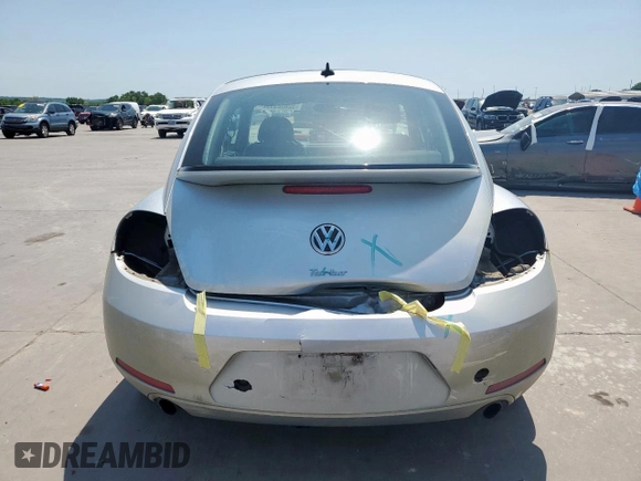 2012 Volkswagen Beetle with VIN 3VWV87AT7CM610251, listed as a Copart auction lot 52852395 with 77,550 mi miles and Salvage Title. Bid and sale history available at DreamBid. Image 6.