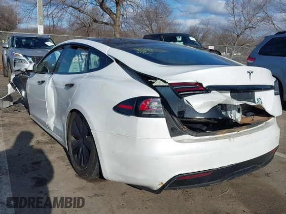 2022 Tesla Model S with VIN 5YJSA1E51NF491493, listed as a IAAI auction lot 41570494 with Not Provided miles and . Bid and sale history available at DreamBid. Image 3.